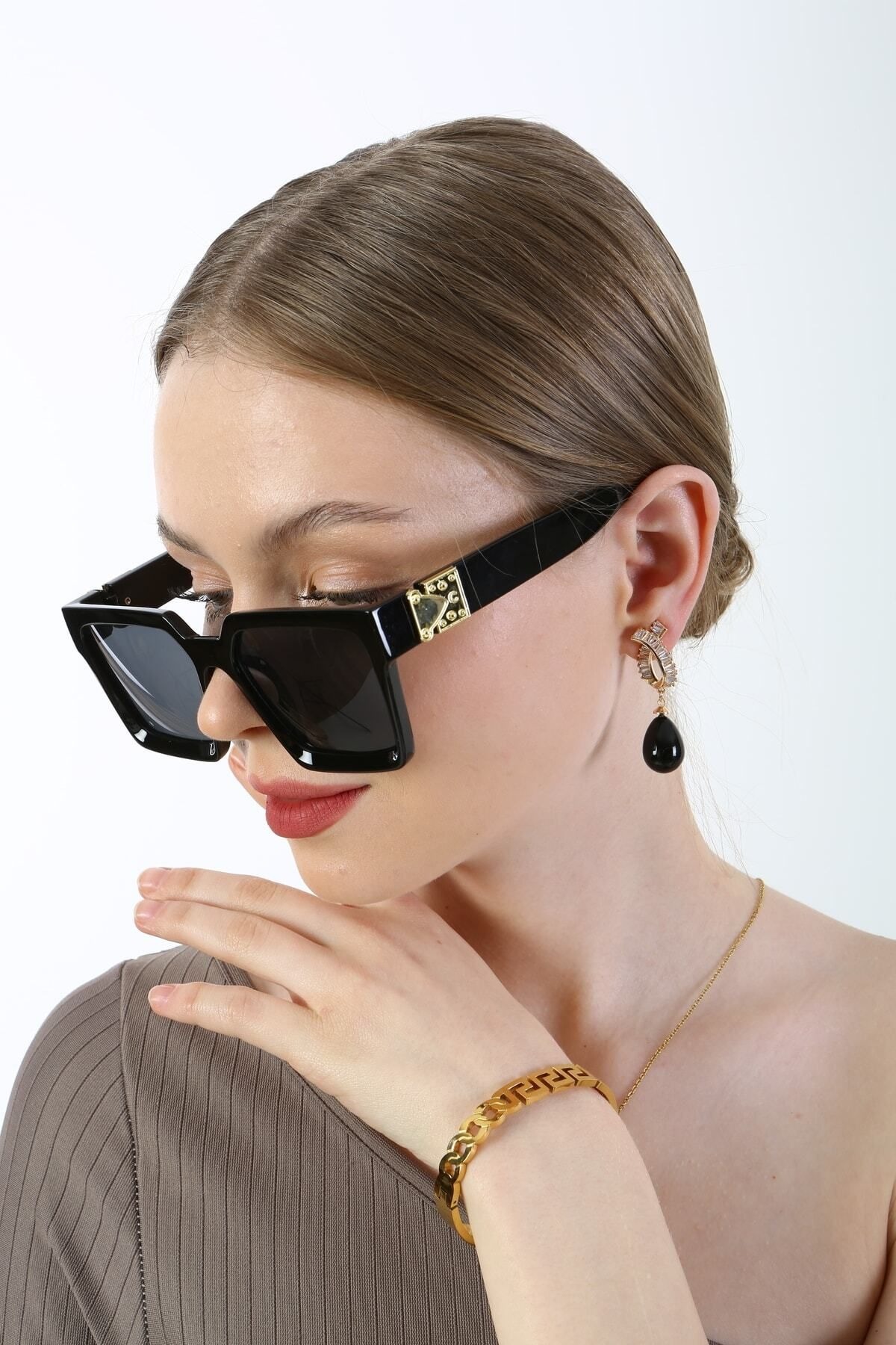 TurkAttar, Gold and Black Women